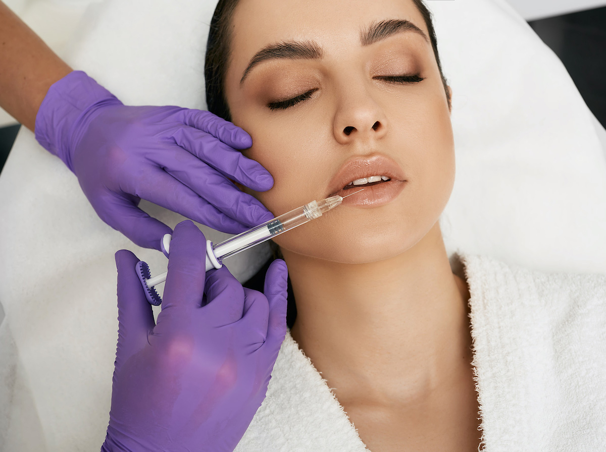 Lips filler injection for beautiful woman lip augmentation with Lips filler injection for beautiful woman lip augmentation with